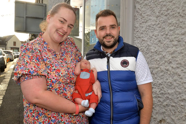 Two-week-old Jonathan Ritchie-Hill was brought to his first parade on Saturday by his parents, Joanne and Nathan when they attended the mini 12th parade in Markethill. PT27-264.