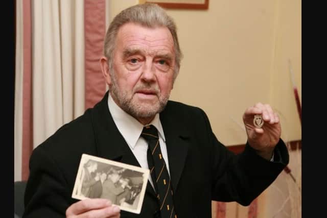 Arthur Curtis proudly displaying the medal he won as a member of the Carrick Rangers team which lifted the Steel & Sons Cup in 1967 after a 3-1 defeat of Dundela. The picture was taken ahead of Carrick Rangers appearing in the final of the same tournament in 2008 which Arthur was planning to attend as a supporter.