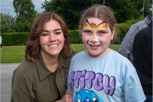 Emily Smith and Phoebe-Rose Duke looking happy at the Loughgall Community Fun Night. PT24-202.