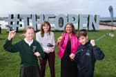 Pictured at Kerr Street Green in Portrush on May 2 during Tourism NI’s Epic Journey to The 153rd Open were Dr Caoimhe Archibald, Economy Minister and Naomi Waite, Marketing Director of Tourism NI alongside Finn Cooper from Mill Strand Integrated Primary School and Sarah Ní Chonaire from St Patrick's Primary School, Portrush.