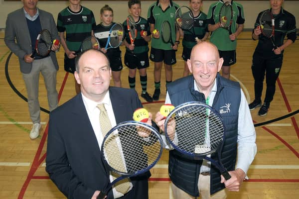 Ian Matthews, principal, Rathfriland HS & George Lucas, chair Sport NI and Ulster Tennis Branch Ireland. Back: Ian McConnell, chairman Board of Governors, Year 10 pupils, Leanne Martin, PE teacher. © Photo: Gary Gardiner.