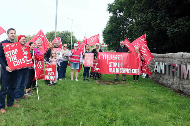 Health workers protest against health service cuts outside Antrim Area Hospital on Thursday morning. Picture: Stephen Davison / Pacemaker