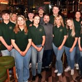 Staff at the new Maisie's Bar Restaurant in Portadown, Co Armagh including Willard, right, general manager, and Paulo, centre, head chef. PT49-219.