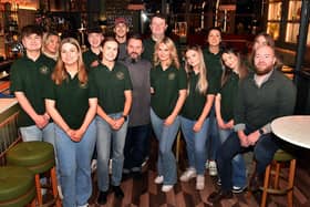 Staff at the new Maisie's Bar Restaurant in Portadown, Co Armagh including Willard, right, general manager, and Paulo, centre, head chef. PT49-219.