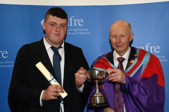 John Mawhinney (Draperstown) received the NIAPA Cup presented for performance in animal husbandry on the Level 2 Advanced Technical Certificate in Agriculture at the Greenmount Campus graduation ceremony presented by Dr Eric Long (Head of Education, CAFRE).