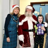 Lord Mayor of ABC Council, Alderman Margaret Tinsley pictured during her visit to Blossom Unit at Craigavon Area Hospital with Santa.