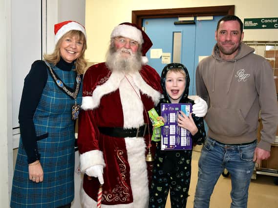 Lord Mayor of ABC Council, Alderman Margaret Tinsley pictured during her visit to Blossom Unit at Craigavon Area Hospital with Santa.