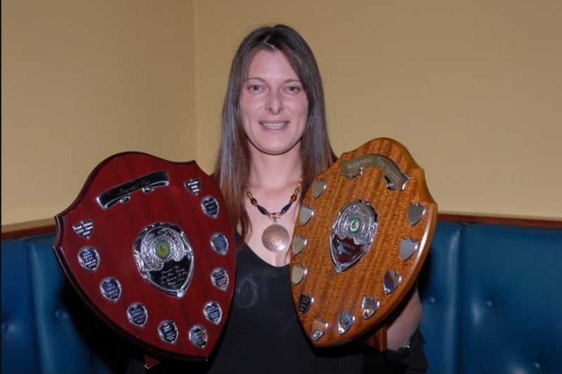 Lisa Hutchinson pictured at the 2007 Mounthill Fair prize giving with trophies for Young Horse Championship and Collared Championship.