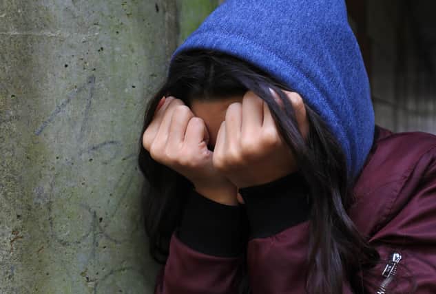PICTURE POSED BY MODEL of a teenage girl with her head in her hands showing signs of mental health issues. PA Photo. Picture date: Sunday February 2, 2020. Photo credit should read: Gareth Fuller/PA Wire