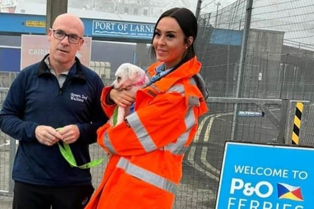 Issy with Council’s Nigel Devine boarding the ferry.