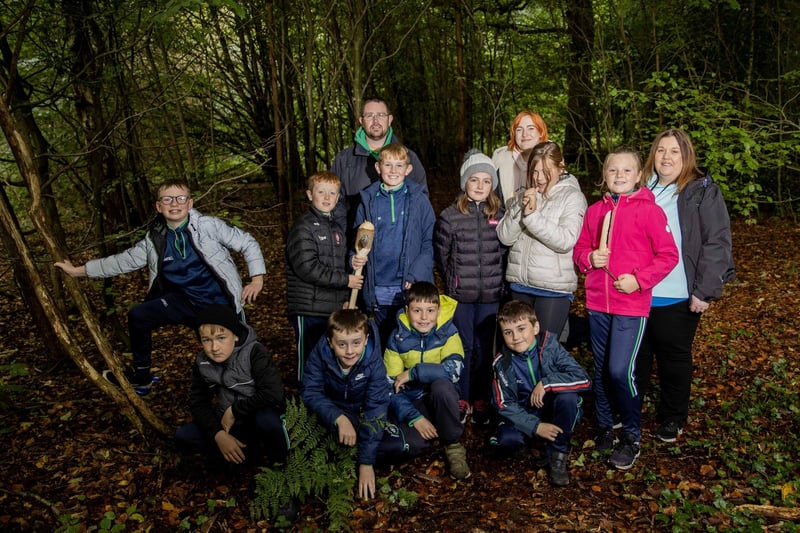 Staff and pupils from St Canice’s Primary School Feeny, with students from Ulster University School of Education and Nic Wright from Causeway Coast and Glens Museum Services after a workshop looking at stone age technology.