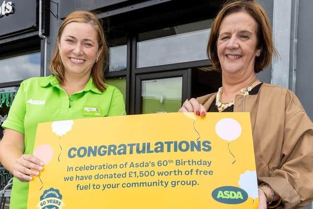 Asda Strabane surprises Strabane Community Project with a lucky Golden Ticket for £1,500 worth of free fuel. Pictured are and Emma Kelly (left) and Ursula Doherty (right)