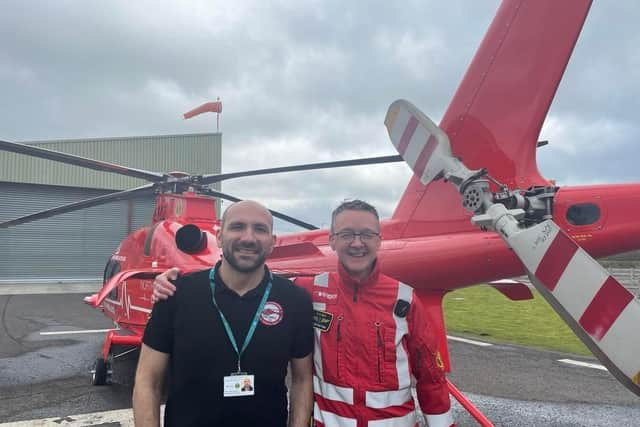 HEMS administrator Lukasz Karpinski and HEMS Paramedic Mike Patton are part of the Air Ambulance marathon relay team