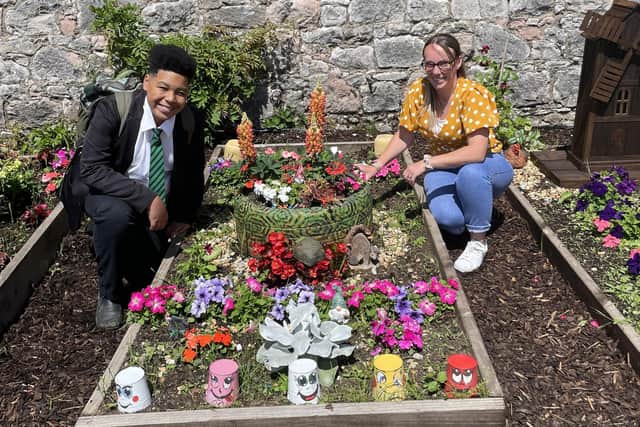 Congratulations to Joseph and key adult, Siobhan, who scooped third place in Holy Trinity's flowerbed competition. Credit: Holy Trinity College