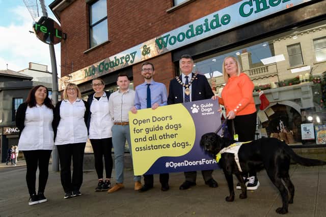 Staff From Mccoubreys Pharmacy, Larne, with the Mayor of Mid and East Antrim, Alderman Noel Williams, Caroline Mcallister and 'Ebony'.