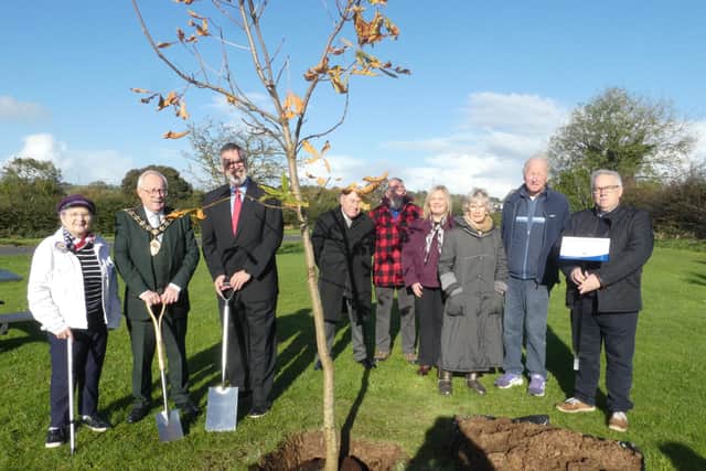 Mayor Thomas Gordon plants a commemorative tree together with Matt Mayberry of the US Consulate and community representatives, to commemorate the links with Ballycarry and local man John Neilson, who became personal architect to President Thomas Jefferson. Photo: MEABC