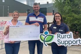 Gareth and Christina Murray are pictured with Hannah Kirkpatrick from Rural Support. Credit: Rural Support