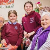Valerie Davis and Lorna Stewart with Emilee Elder and Imogen McGuinness, enjoying the festivities at Balnamore Community Association’s Christmas dinner, funded by The National Lottery Community Fund