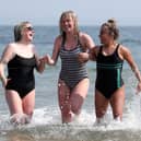Anna Watson, Charlotte Rea and Sophie Watson cooling off at Helen's Bay on Saturday.  Picture:  Declan Roughan / Press Eye