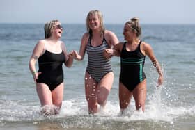 Anna Watson, Charlotte Rea and Sophie Watson cooling off at Helen's Bay on Saturday.  Picture:  Declan Roughan / Press Eye