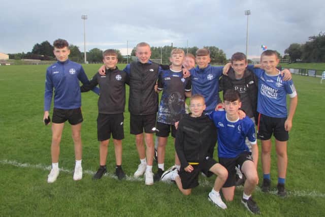 Some young fans of Clan na Gael celebrating in Davitt Park in Lurgan, Co Armagh after the final whistle which saw a draw against county rivals Crossmaglen in the Senior Club Championships.