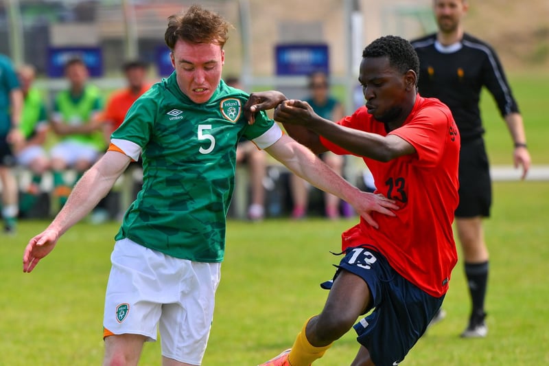 Eamon Quinn, a member of Eagles Special Olympics Club, from Cookstown, Co Tyrone, in action against Jacob Eliya of Uganda during the qualifier match between Ireland and Uganda on day three of the World Special Olympic Games 2023.  Photo by: Ray McManus/Sportsfile