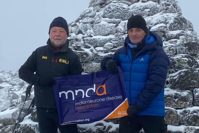 Kevin and Jim on the summit of Ben Nevis. Credit RNLI