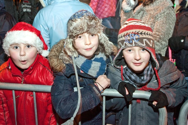 These three little ones get their pictured took at Ballymoney Christmas lights switch on back in November 2010