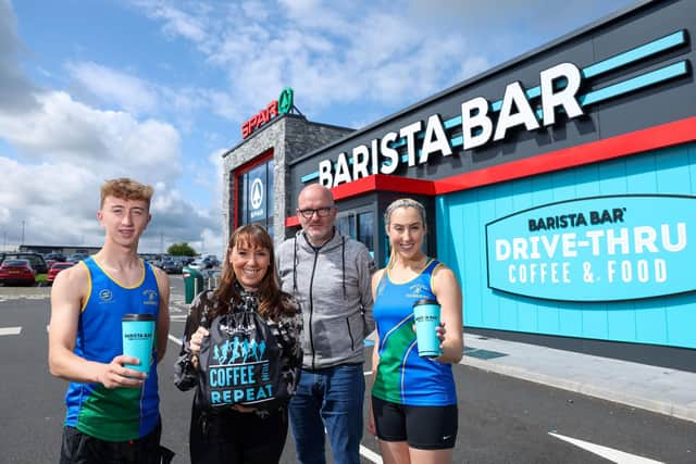 Adam McCann and Dawn Blain are pictured with Keavy O’Mahony Truesdale, Brand Manager at Barista Bar and Alex Davidson of the Mallusk Harriers Athletics Club. (Contributed).