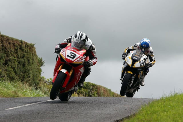 Michael Dunlop and Keith Amor in action on race day around the Armoy Circuit on their superbikes back in 2010