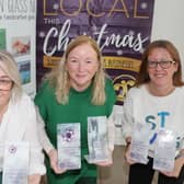 Denise Loughrey of Artisan Glass NI, Geraldine Wills (left) and Catrina McNeill, Council’s Town and Village Management officers, launch this year’s Christmas window display competition. Credit Causeway Coast and Glens Council