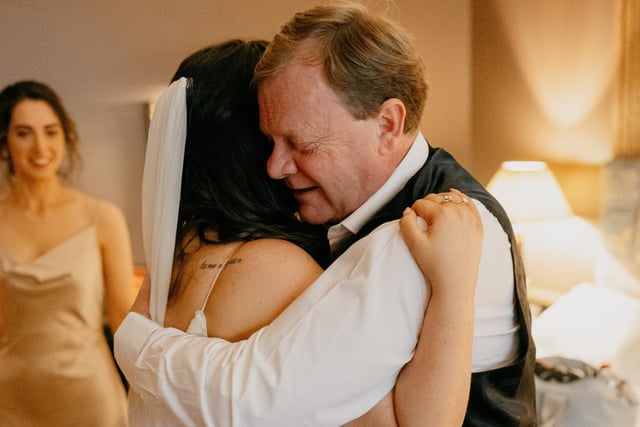 Amy and her beloved dad share a special moment on Amy's wedding day. Despite initially planning to wait for a few years before tying the knot, an unexpected health diagnosis meant the couple brought their special nuptials forward:
"We’d planned to do a long engagement,” Amy explains. “But my Dad was unfortunately diagnosed with cancer last year so we decided not to wait so we could celebrate with everyone we love the most!" Iain Irwin Photography