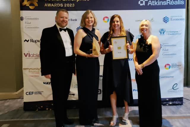 Aoife Hamilton and Sandra Bolan from High Rise Lisburn being presented with the Award for Best Use of Social Media by representatives of the Northern Ireland Housing Executive, at the Social Enterprise NI Awards. Pic credit: Social Enterprise Northern Ireland Awards