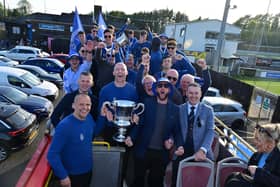 Irish Cup winners Dungannon Swifts enjoy a open top bus tour through the town.