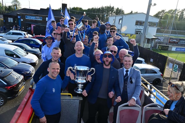 Irish Cup winners Dungannon Swifts enjoy a open top bus tour through the town.