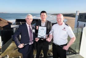 Aidan McPeake, Director of Environmental Services at Causeway Coast & Glens Borough Council, David Roberts, Director of Strategic Development at Tourism Northern Ireland and Andy McKeown, Station Commander at the Northern Ireland Fire & Rescue Service, launch Tourism NI’s accommodation certification campaign ahead of The Open in Portrush in July. CREDIT CCGBC