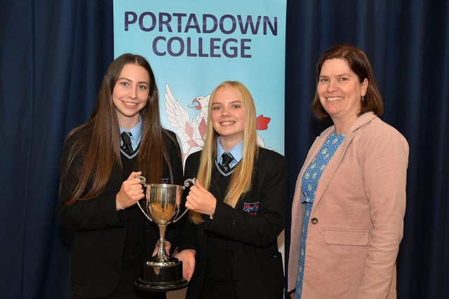 Portadown College Senior teacher, Mrs McGuinness, pictured with students who were awarded prizes for sport.
