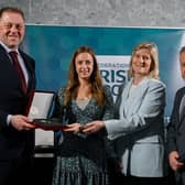 Cathryn Watson of Ballymoney Hockey Club, second left, receives her award from Minister of State for Sport and Physical Education Thomas Byrne TD, left, Federation of Irish Sport chair Clare McGrath, and Louth Sports Partnership and Louth County Council head of sport, Federation of Irish Sport board member and member of the Awards Judging Panel Graham Russell, right, during the Federation of Irish Sport Volunteers in Sport Awards at The Crowne Plaza Hotel in Blanchardstown, Dublin.  Photo by Seb Daly/Sportsfile