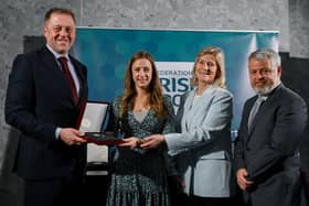 Cathryn Watson of Ballymoney Hockey Club, second left, receives her award from Minister of State for Sport and Physical Education Thomas Byrne TD, left, Federation of Irish Sport chair Clare McGrath, and Louth Sports Partnership and Louth County Council head of sport, Federation of Irish Sport board member and member of the Awards Judging Panel Graham Russell, right, during the Federation of Irish Sport Volunteers in Sport Awards at The Crowne Plaza Hotel in Blanchardstown, Dublin.  Photo by Seb Daly/Sportsfile