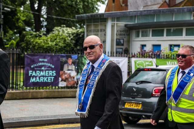 Orangemen gather for the Empire Sunday parade in Lisburn and church service at Lambeg Parish