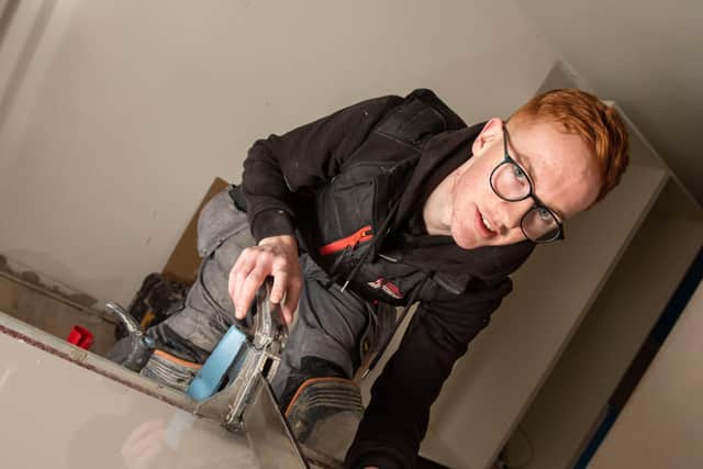 Timothy Gilmore, who works for SMC Tiling and studies the Level 3 in Wall and Floor Tiling at NWRC’s Greystone Campus, is one of the 16 top construction trainees from across Northern Ireland to compete in the finals. Credit NWRC