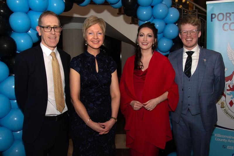Posing happily at the Portadown College 100th anniversary dinner are from left, Peter Richardson, vice principal; Gillian Gibb, school principal; Emma Little Pengelly, Deputy First Minister and Dr Tim Neill, former pupil. PT11-219.