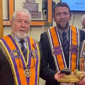 One of the oldest serving Worshipful Masters in Northern Ireland, and possibly the world, has stepped down as Wm after 65-years with the Orange Order. Eighty-nine-year-old Wor Bro Andy McLean from County Antrim joined the Benvarden Temperance True Blues LOL 1001 on March 2 1959 at the grand age of 24.  Andy McLean Past Master Benvarden LOL 1001 is pictured during the special installation of officers meeting on Monday with Raymond Rodgers, County Grand Tyler and David Stewart WM Benvarden LOL 1001
