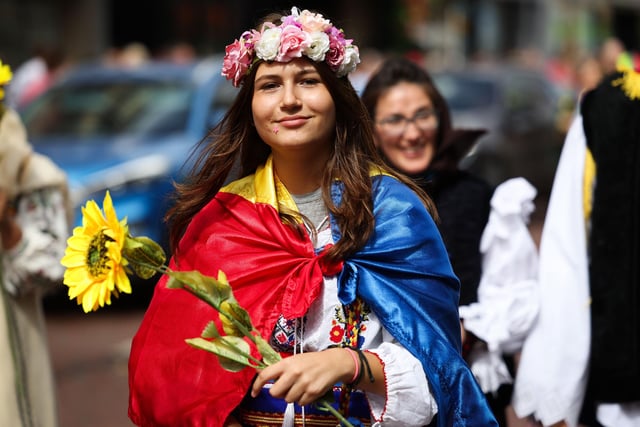 One of the many participants in the Mela Carnival parade who represented 20 different cultures.