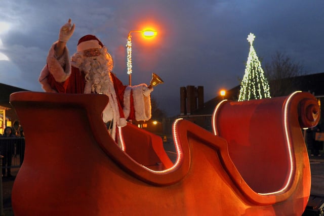 Santa Claus says farewell as the evening dusk arrives at the Brownlow Christmas Lights Switch On event but not for long as Christmas is coming soon. ©Edward Byrne Photography
