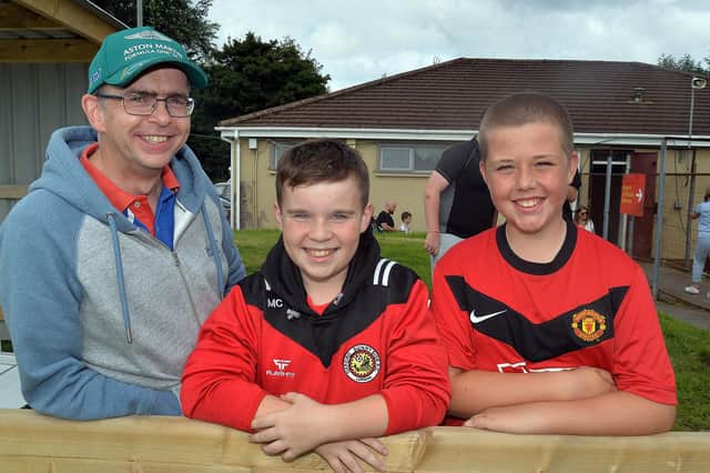 Leslie Conn, son Matthew (12) and friend Connor O'Hagan pictured at the charity fun day and football match on Sunday. LM32-209.