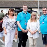 The Housing Executive’s Michelle Hazlett (centre) with Drumgor Detached Youth Project committee members Jackie McAlernon, Barry McCrory, Donal O’Hagan and Sorcha O’Hanlon.