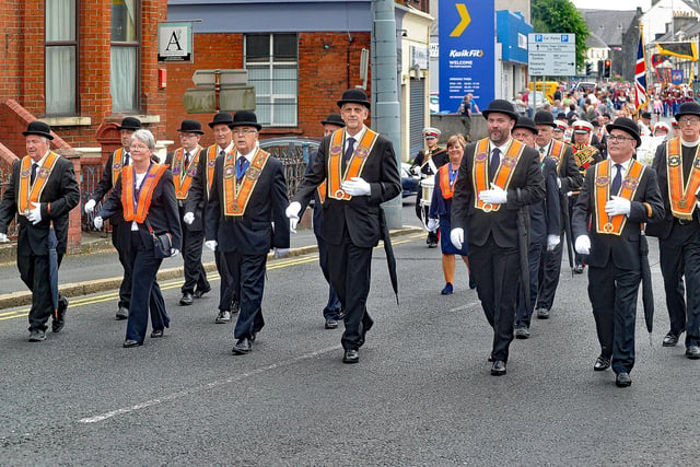 Leading the way ... District officers head the mini Twelfth parade on Saturday evening. PT24-247.