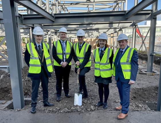 Corey (head boy), Neil Owen (Principal) Permanent Secretary at the Department of Education, Dr Mark Browne, Chair of the BoGs, Mervyn Alexander and Anna (head girl). (Pic: Contributed).