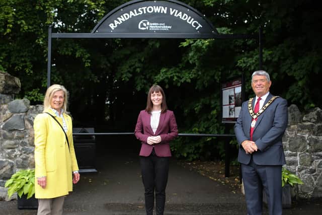 Former Infrastructure Minister Nichola Mallon during a visit to Randalstown, included are Councillor Billy Webb and Helen Boyd, of Tidy Randalstown (archive image).